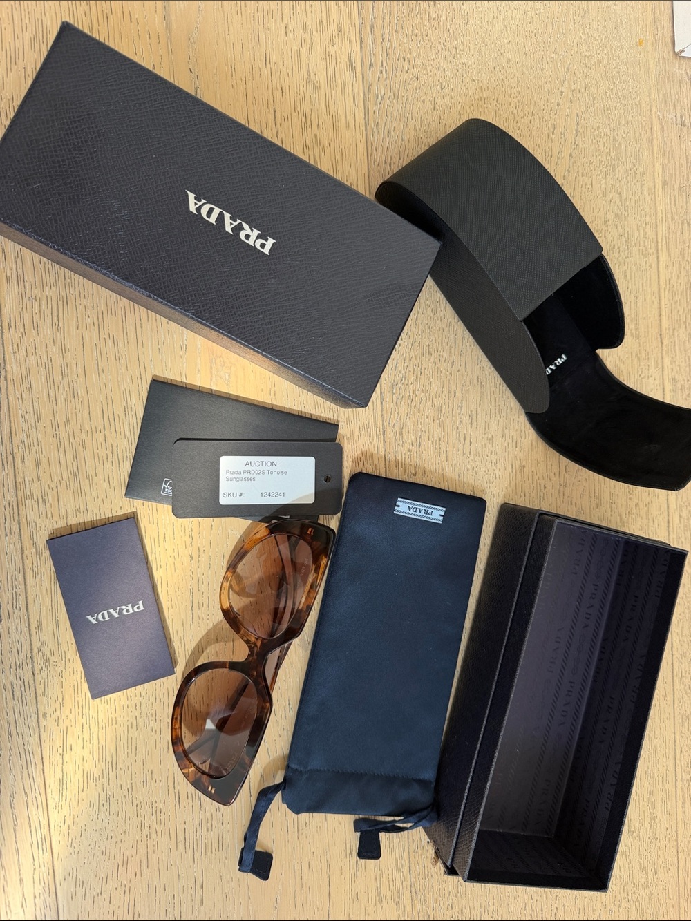 Prada Tortoiseshell Brown Sunglasses with Navy Pouch